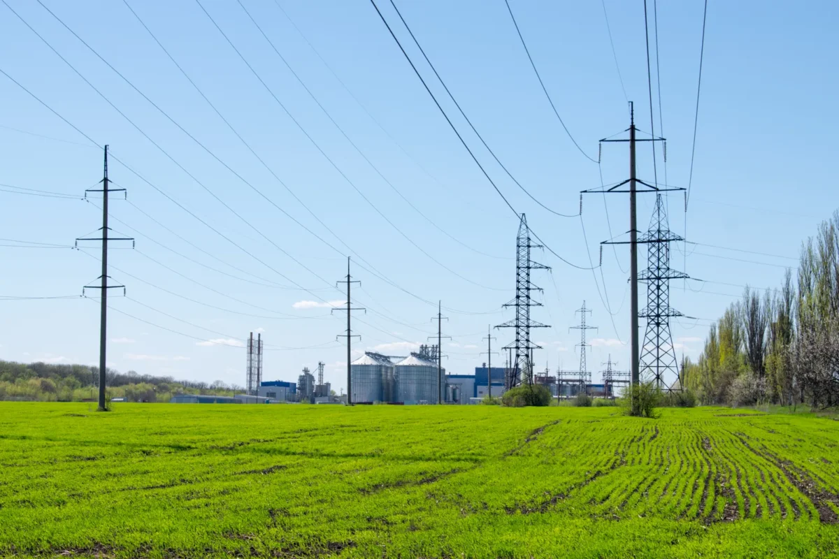 Power transmission towers and lines representing the ERCOT grid network in Texas.